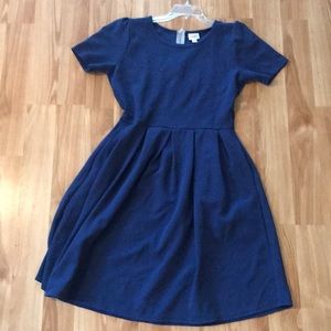 Navy lularoe amelia with flower detailing